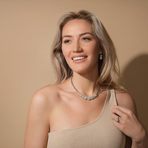 A woman wearing a necklace