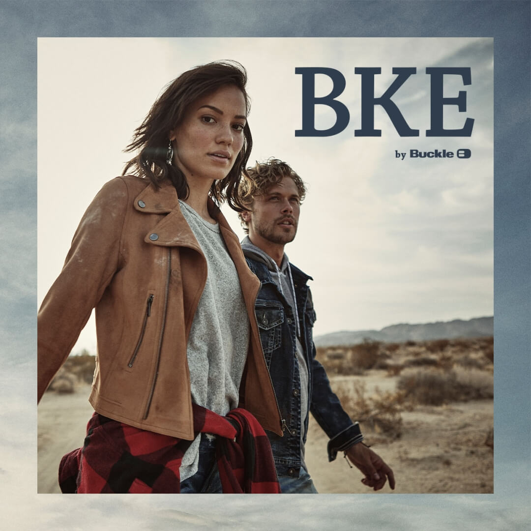 Young womman and man wearing BKE by Buckle apparel in a desert