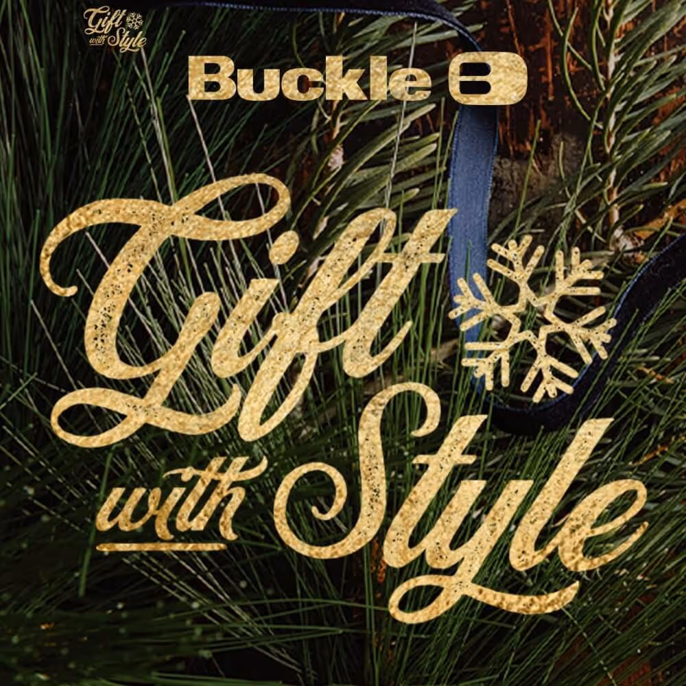 Gift with Style text in gold on black background
