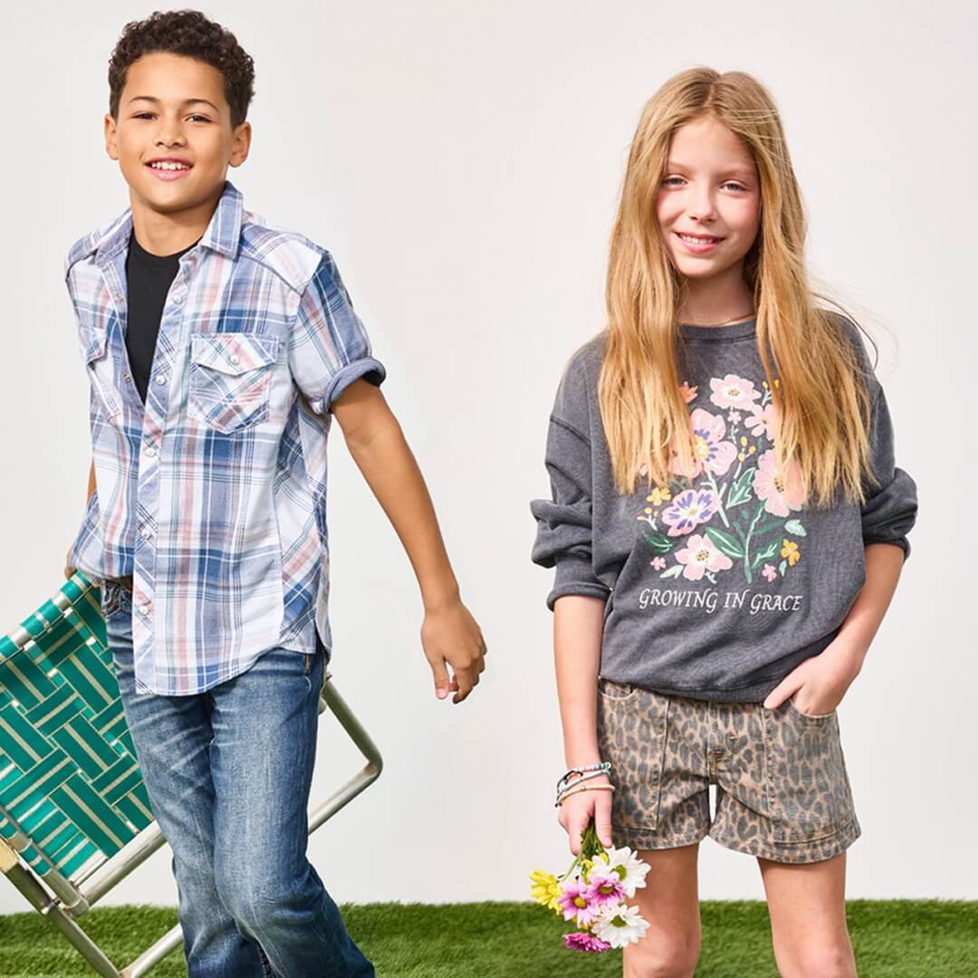 Two kids wearing Buckle apparel