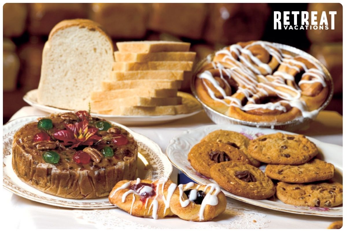 Freshly baked pastries and treats from Dutch Maid Bakery, featuring a variety of golden, flaky breads and sweets