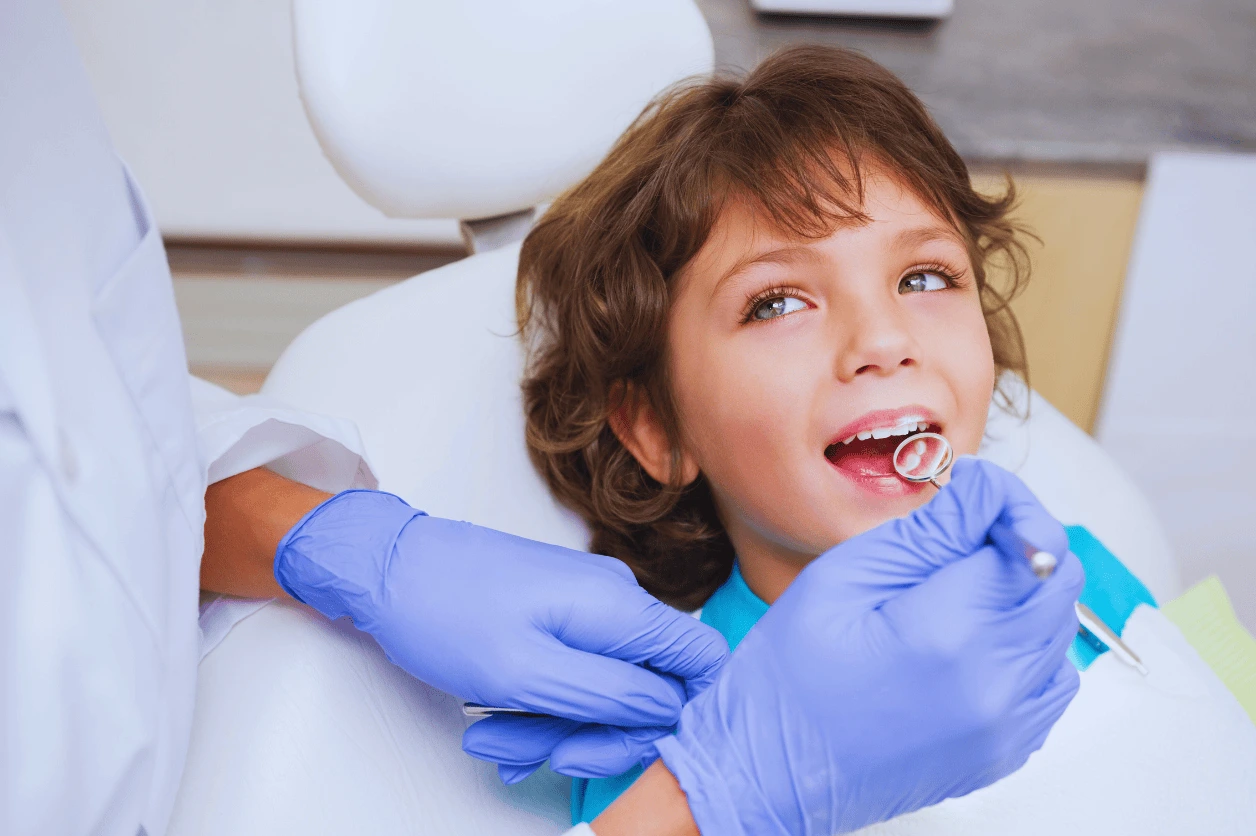 Smiling children enjoying a fun dental visit at Main Street Dental in Vista, CA