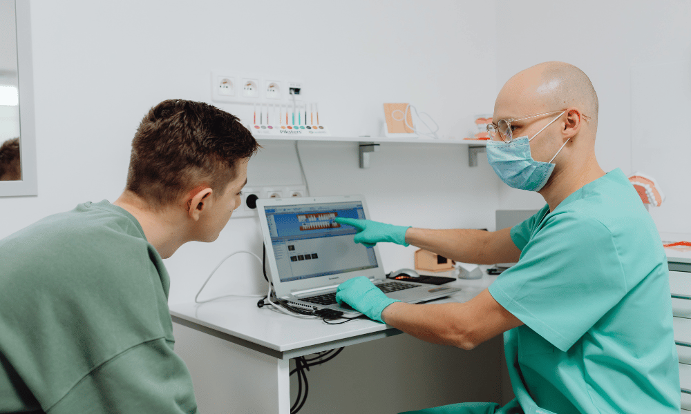 Woman with dental pain at Main Street Dental clinic