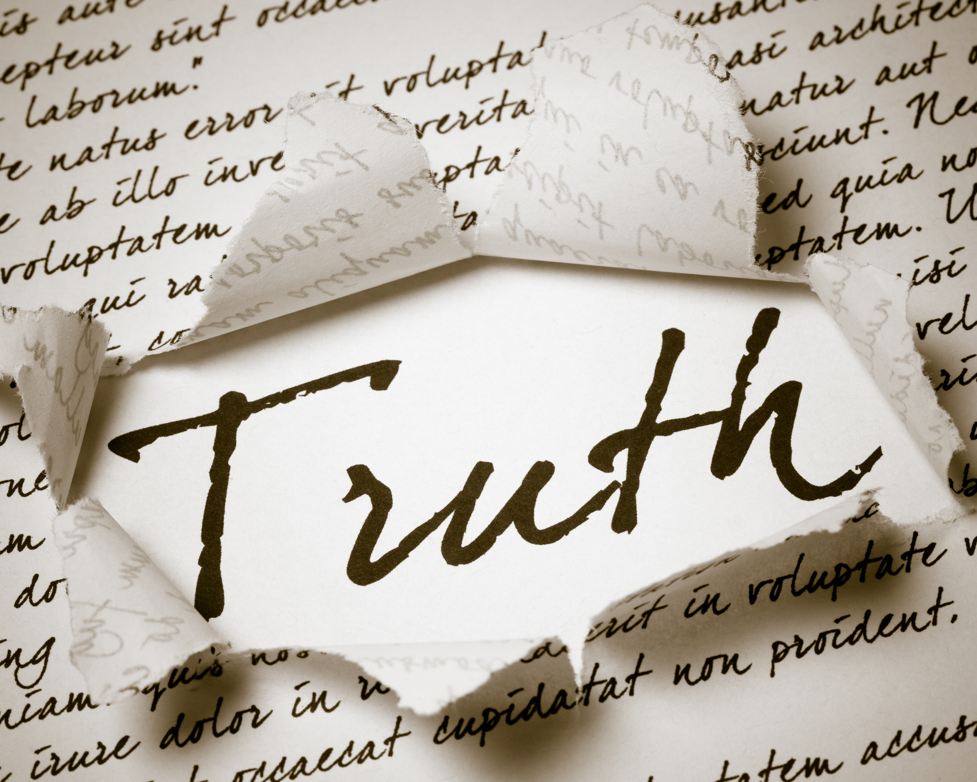 Open Bible on a table — clearing out lies and living by God's truth