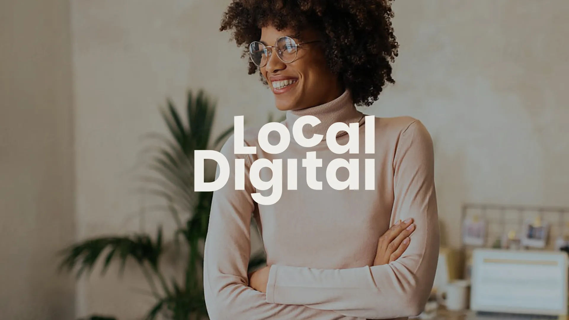 Local Digital Logo overlaying woman smiling in background
