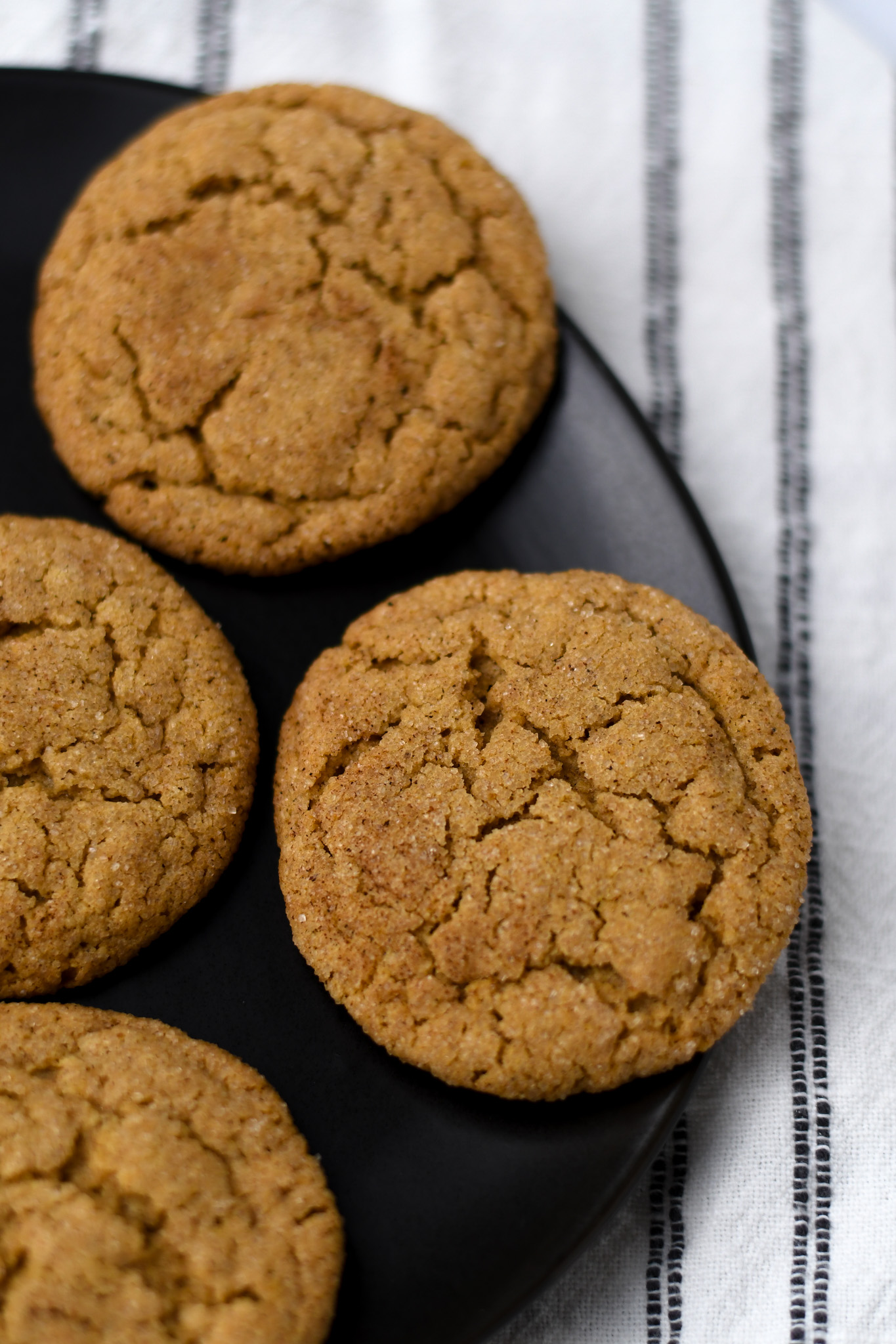 gluten free pumpkin cookies on a black plate