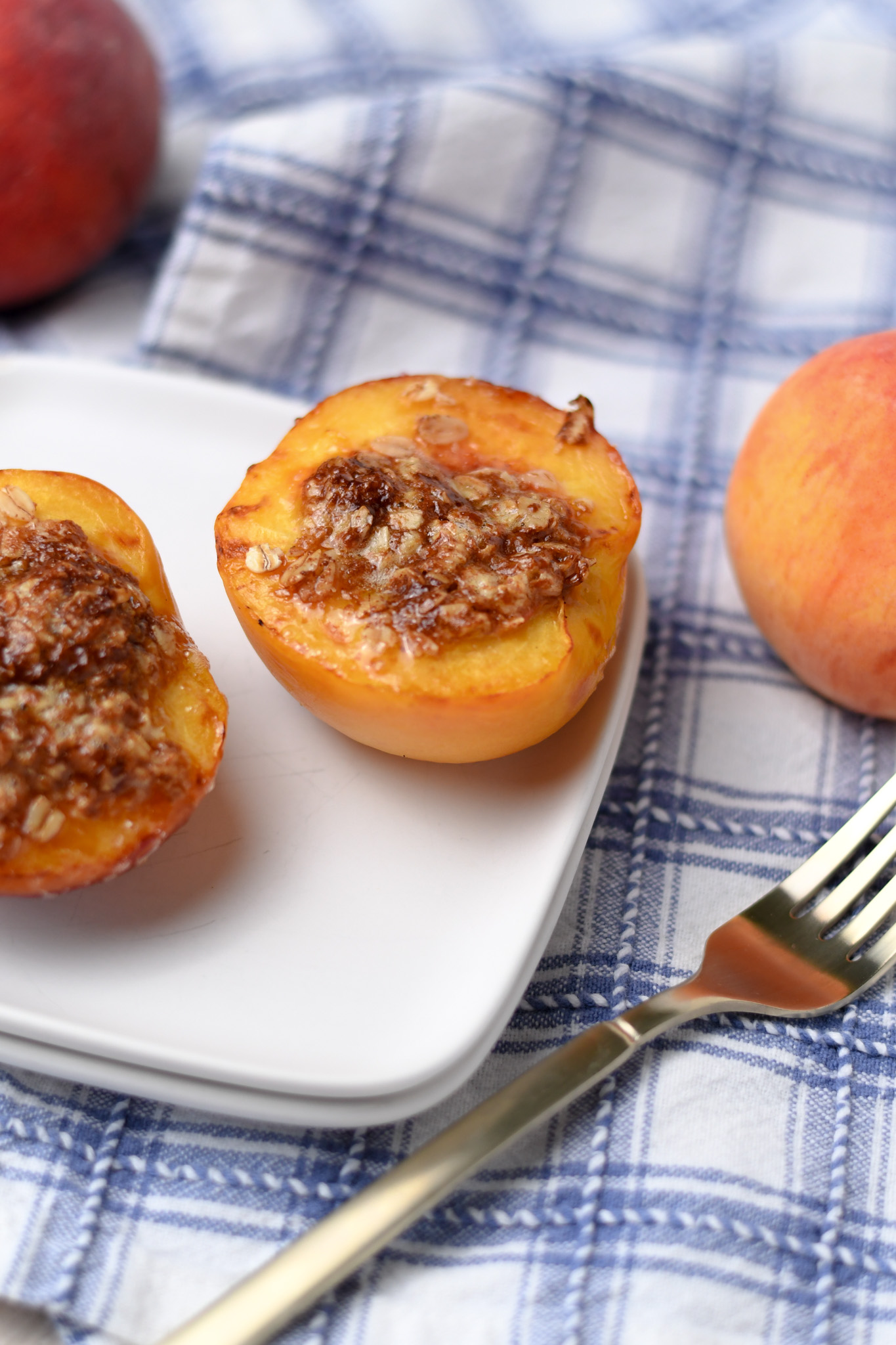 Halved peach with a streusel topping