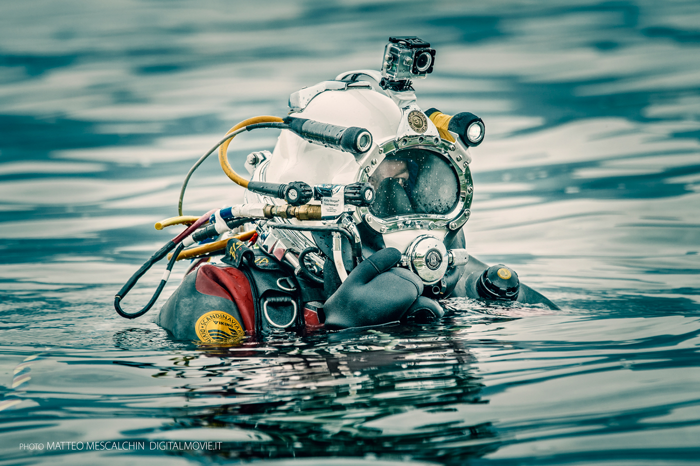 A commercial diver wearing safety gears in a sea