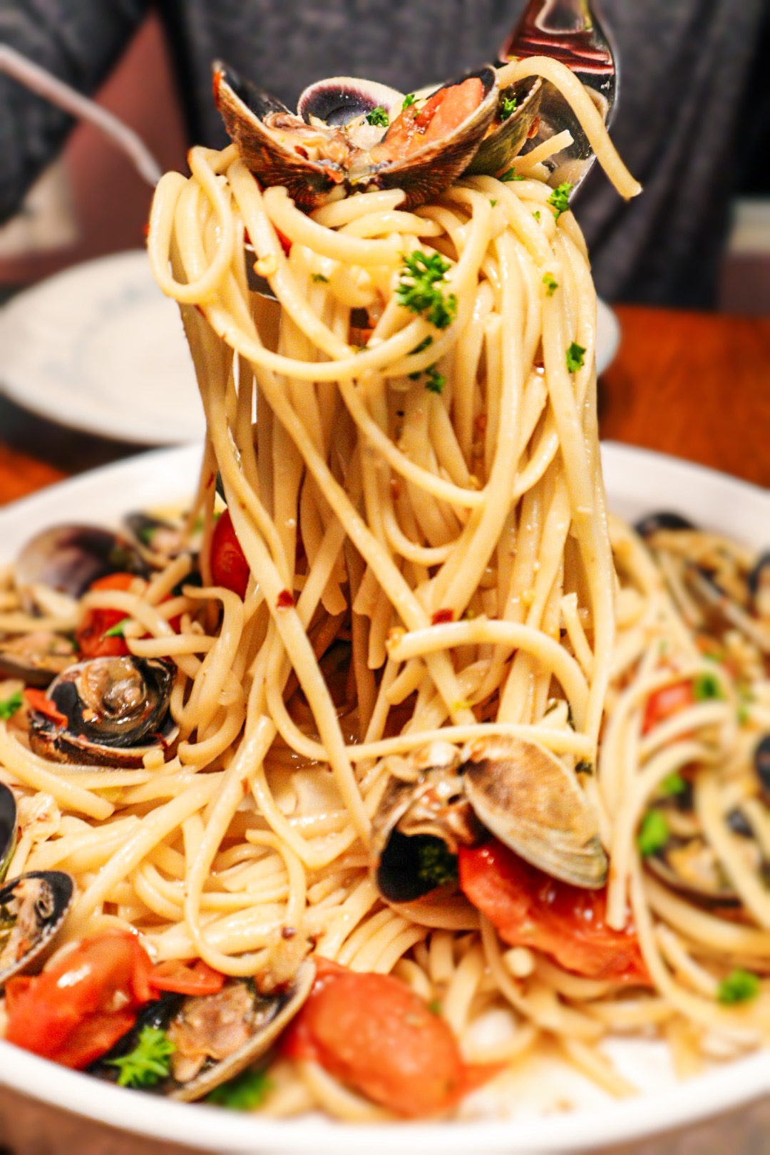 White Wine Lemon Linguini, Clams, Fresh Herbs and Blistered Tomatoes