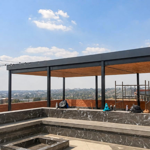 Steel pergola with timber ceiling on rooftop