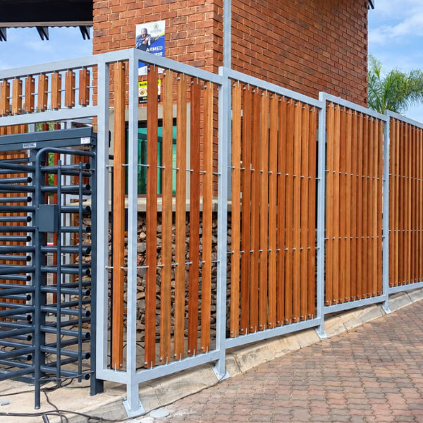 Grey Steel and wood entrance gate for a complex upgrade