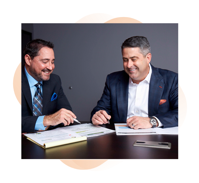 Two high net worth financial planners working together