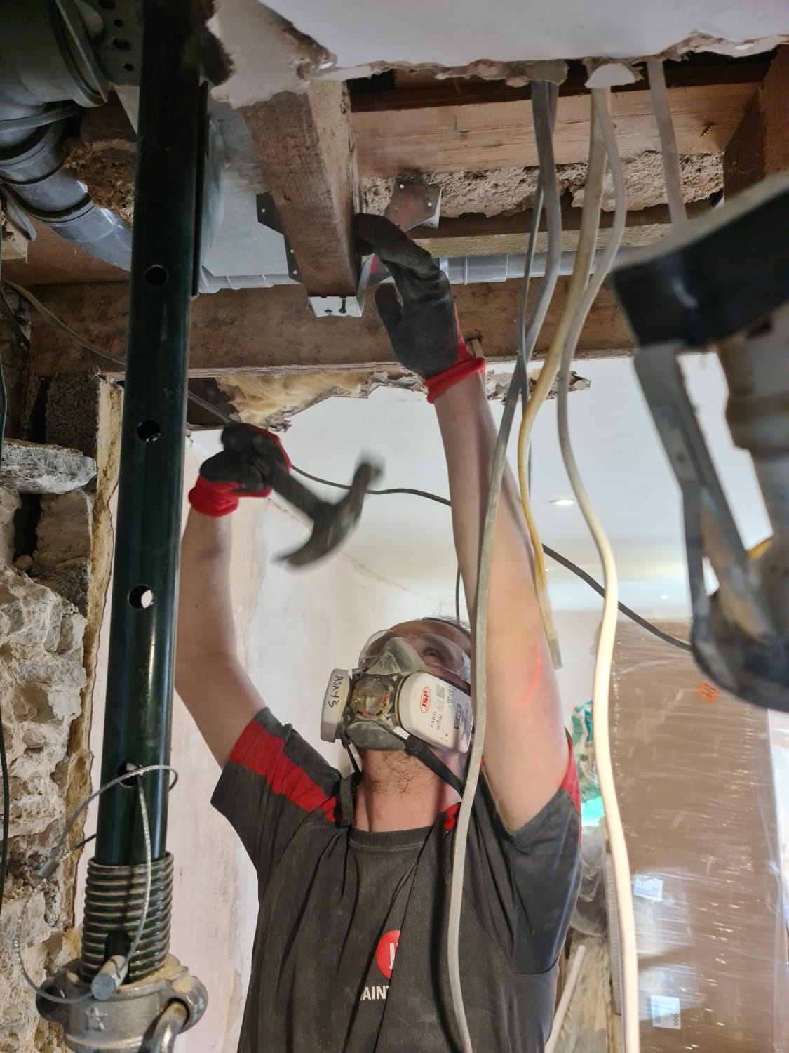 JR Maintenance worker in kitchen
