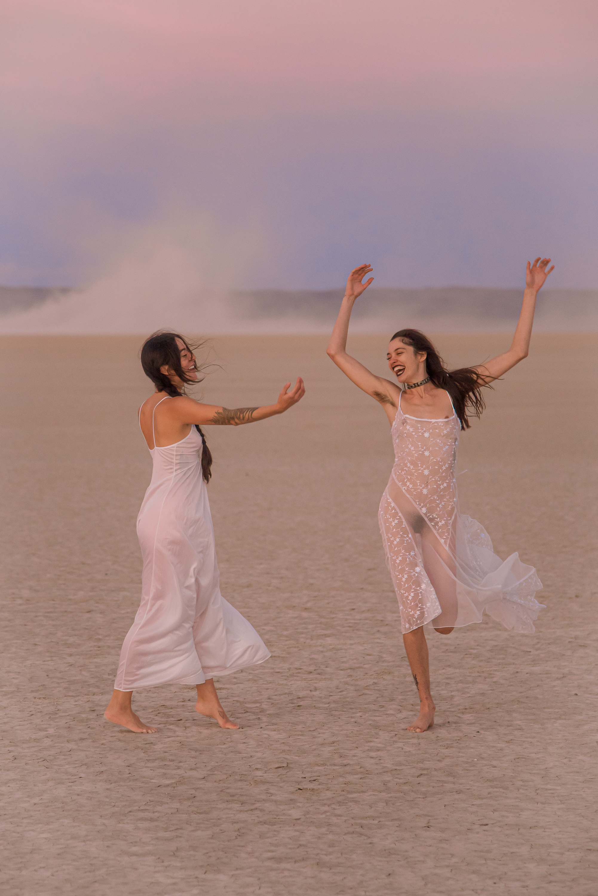 Photograph of two beautiful girls in the desert.