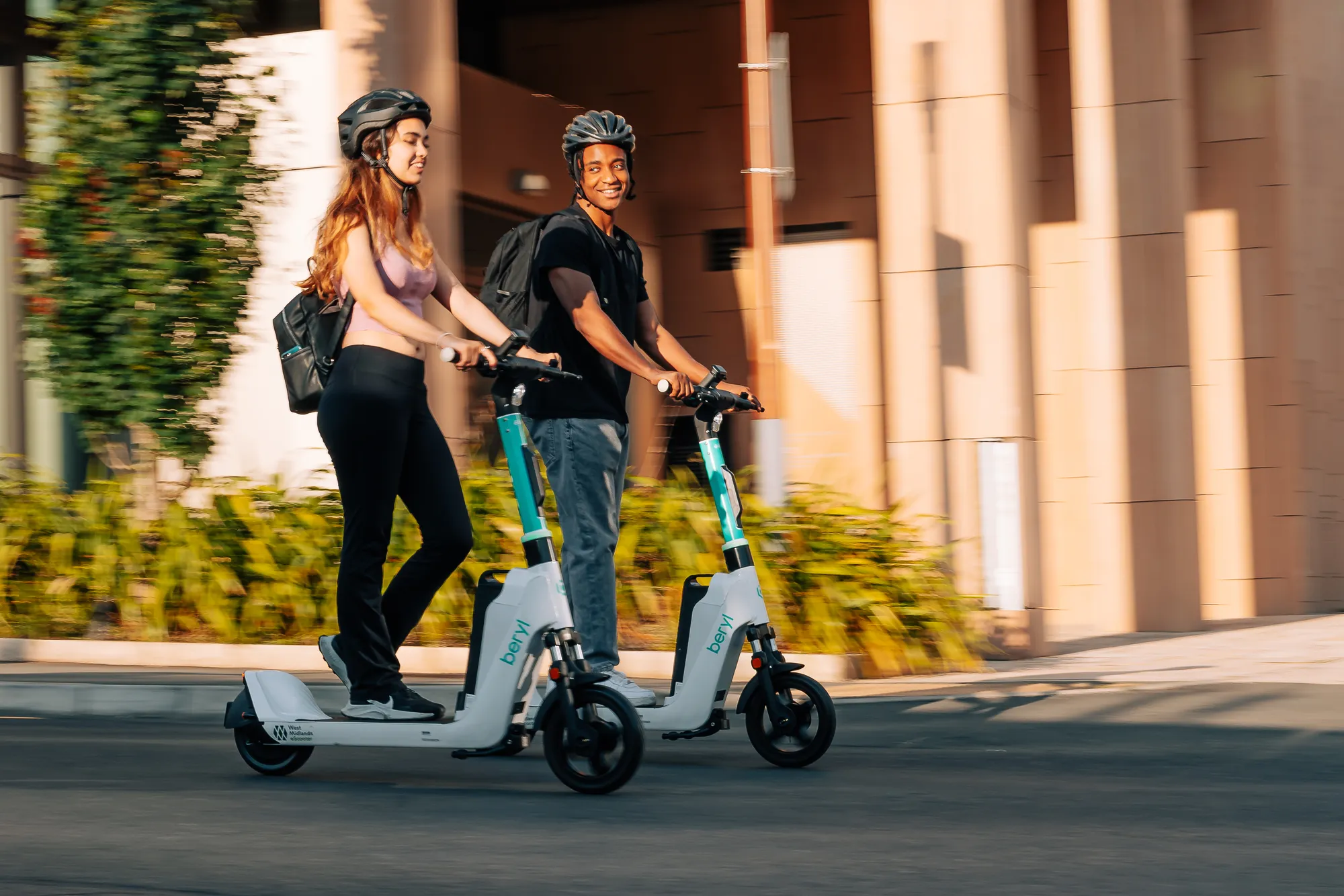 Beryl e-scooters being ridden
