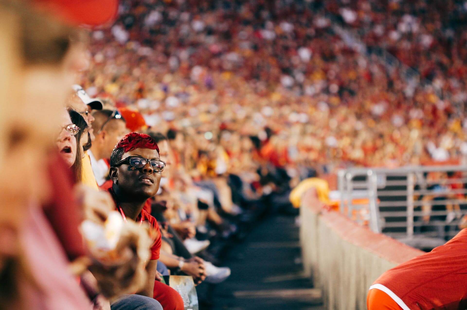 Sports fans in a full stadium