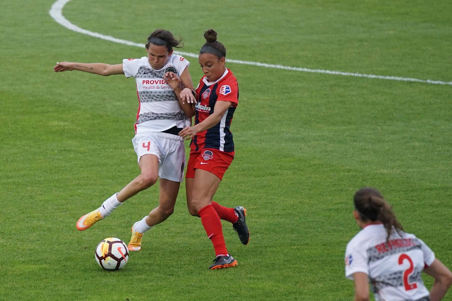 A tackle during a women's professional football match