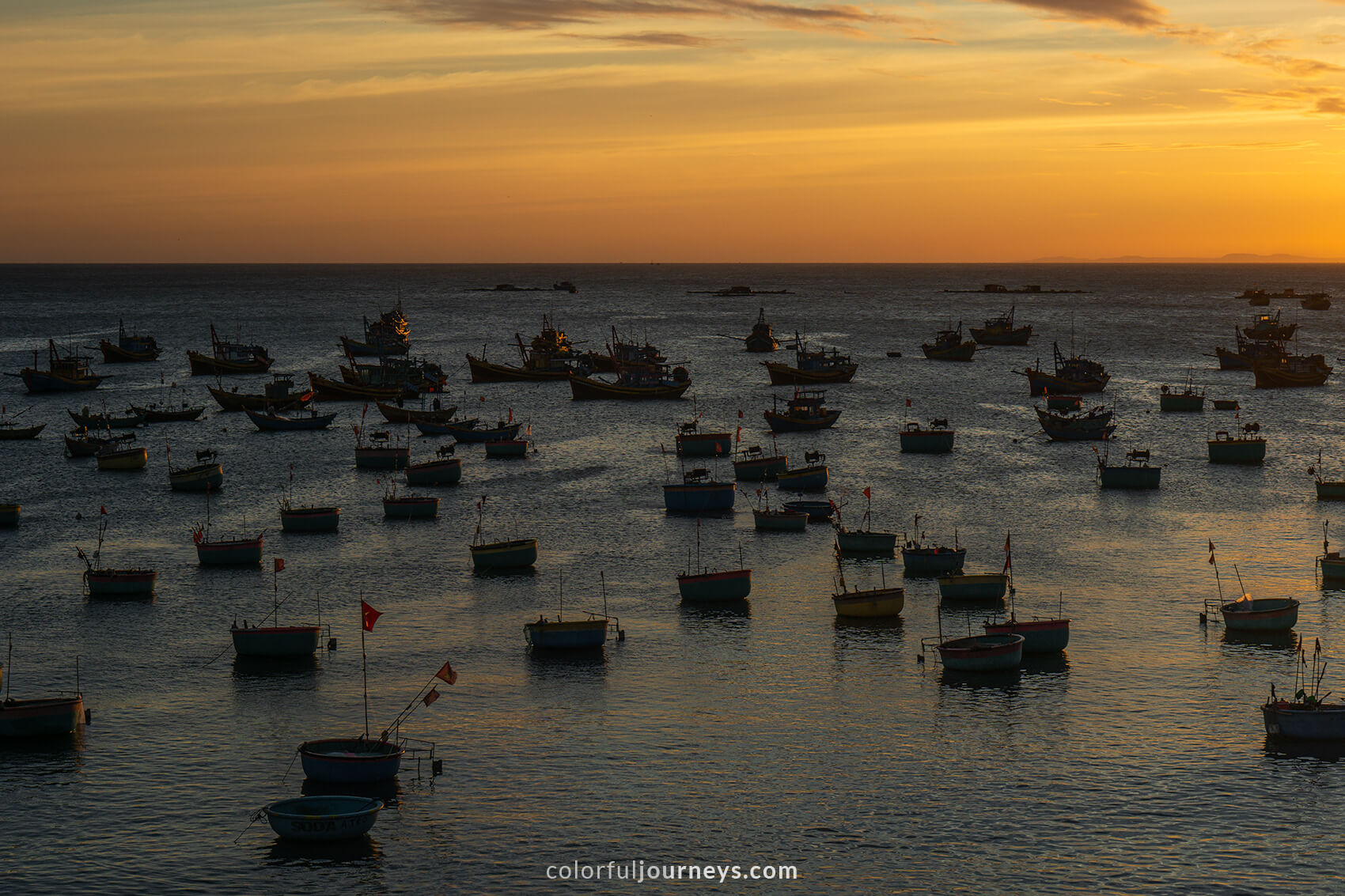 Dozens of boats against the horizon in Mui Ne, Vietnam. 
