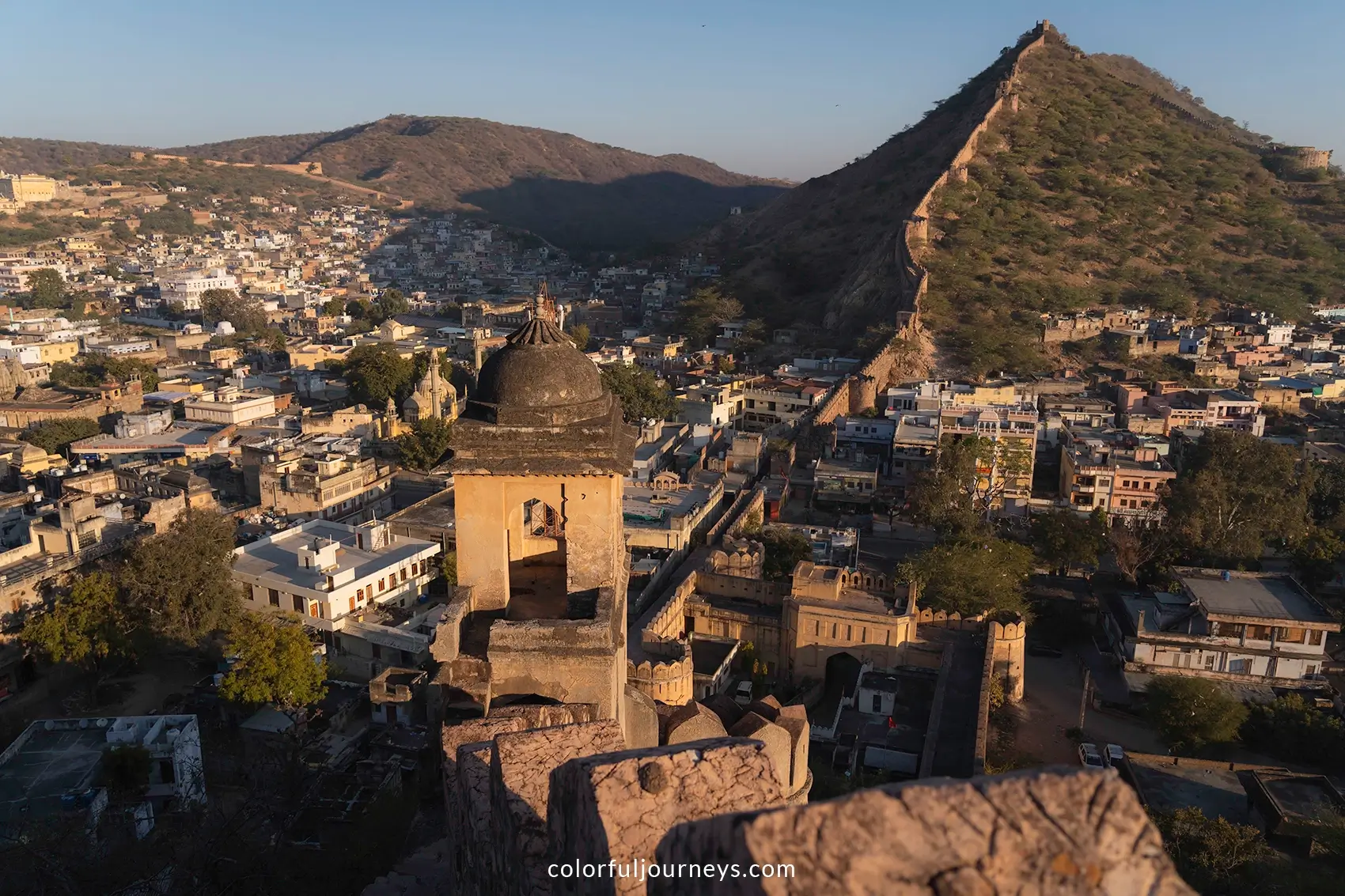 Amer Wall surrounded by houses in Jaipur, India