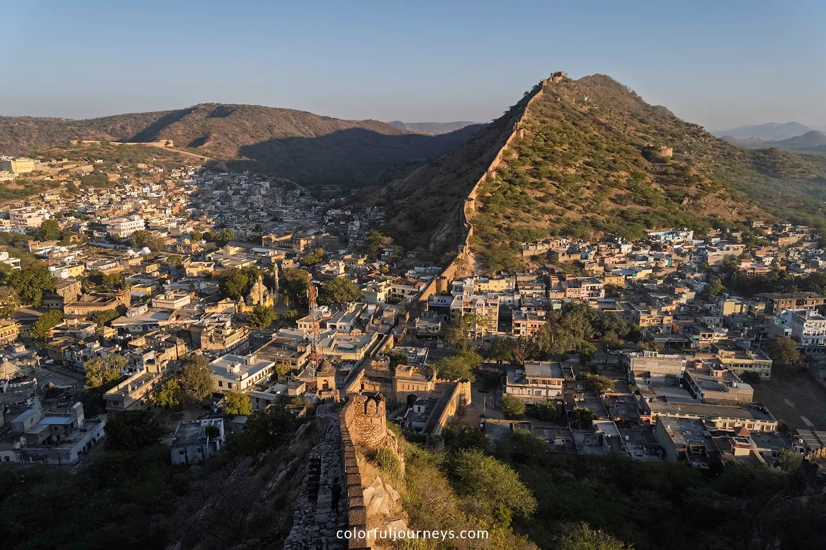 The Amer Wall splits a neighborhood near Jaipur, India