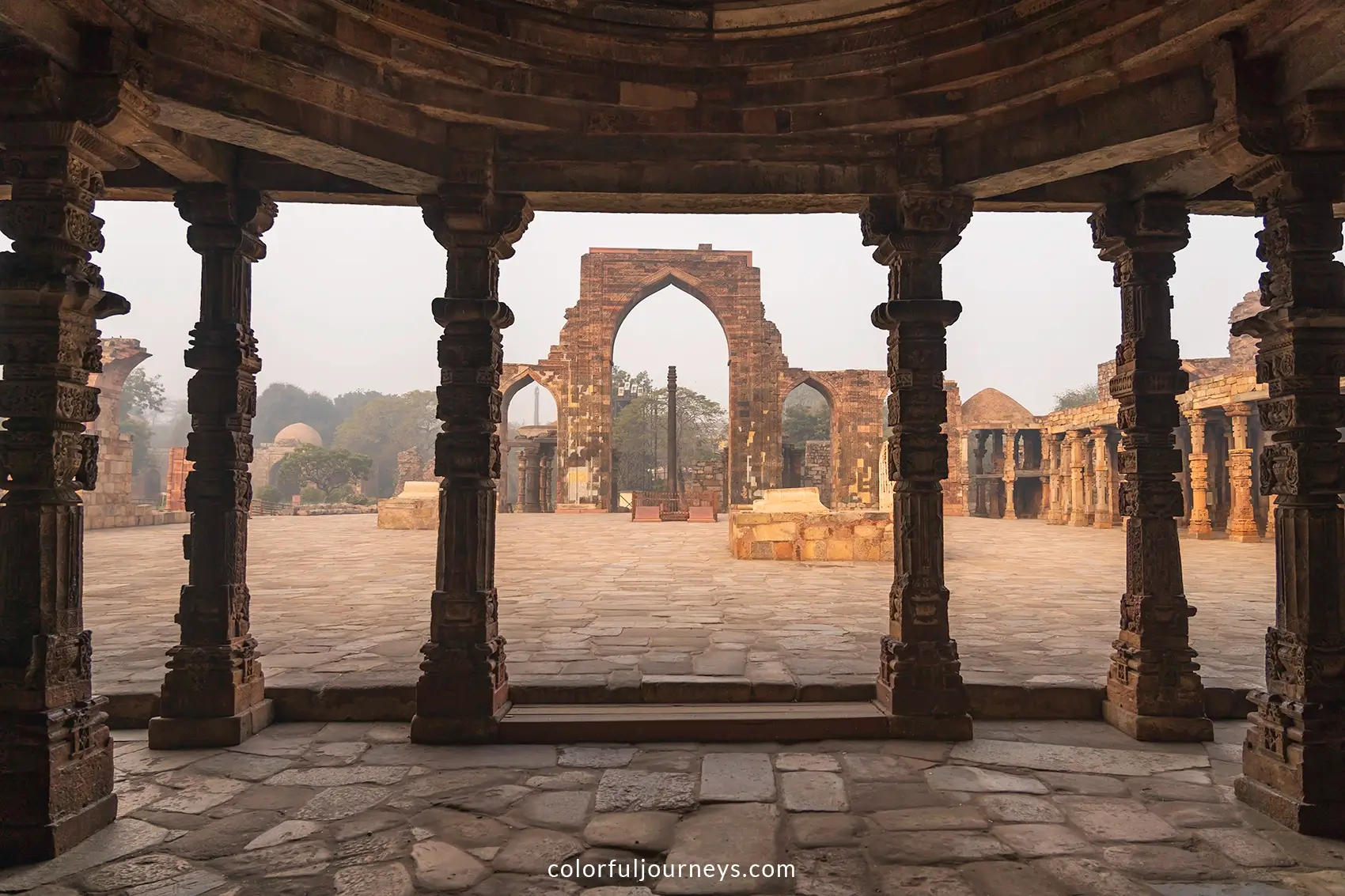 Intricately designed pillars at Qutub Minar in Delhi, India