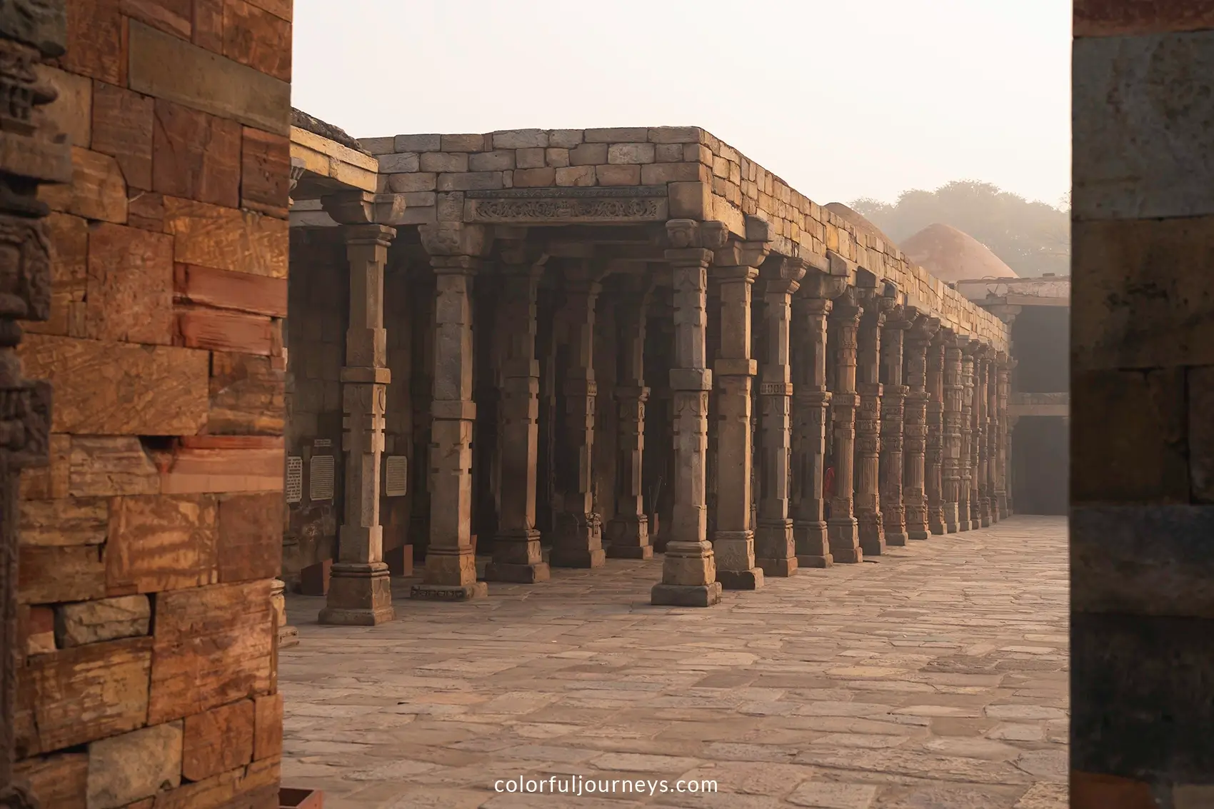 Intricately designed pillars at Qutub Minar in Delhi, India