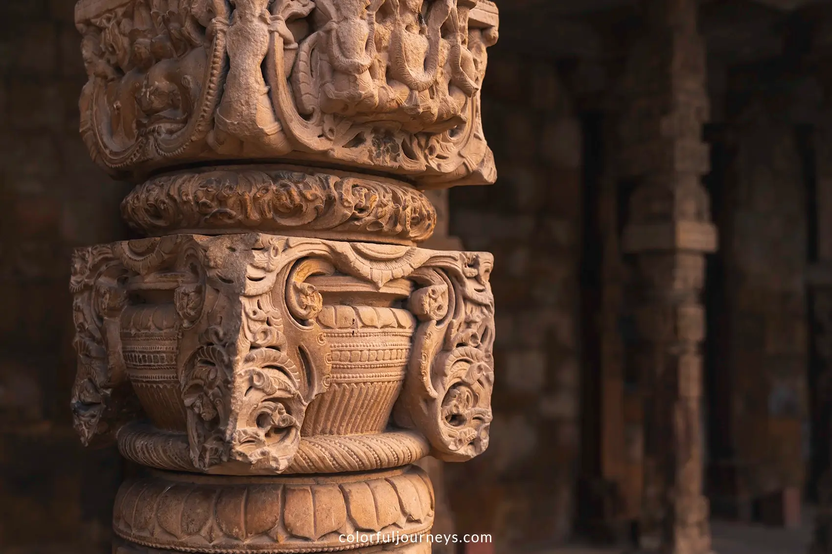 Intricately designed pillars at Qutub Minar in Delhi, India
