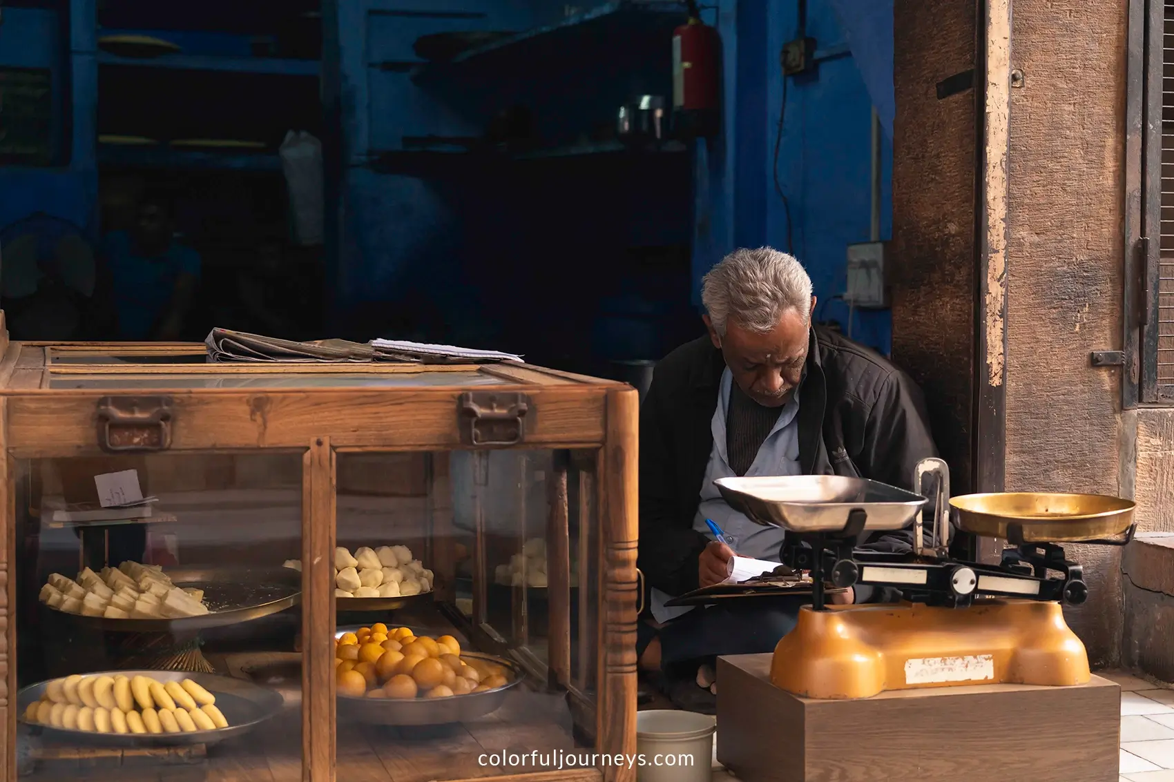 A man sells Gulab Jamun in Jodhpur, India
