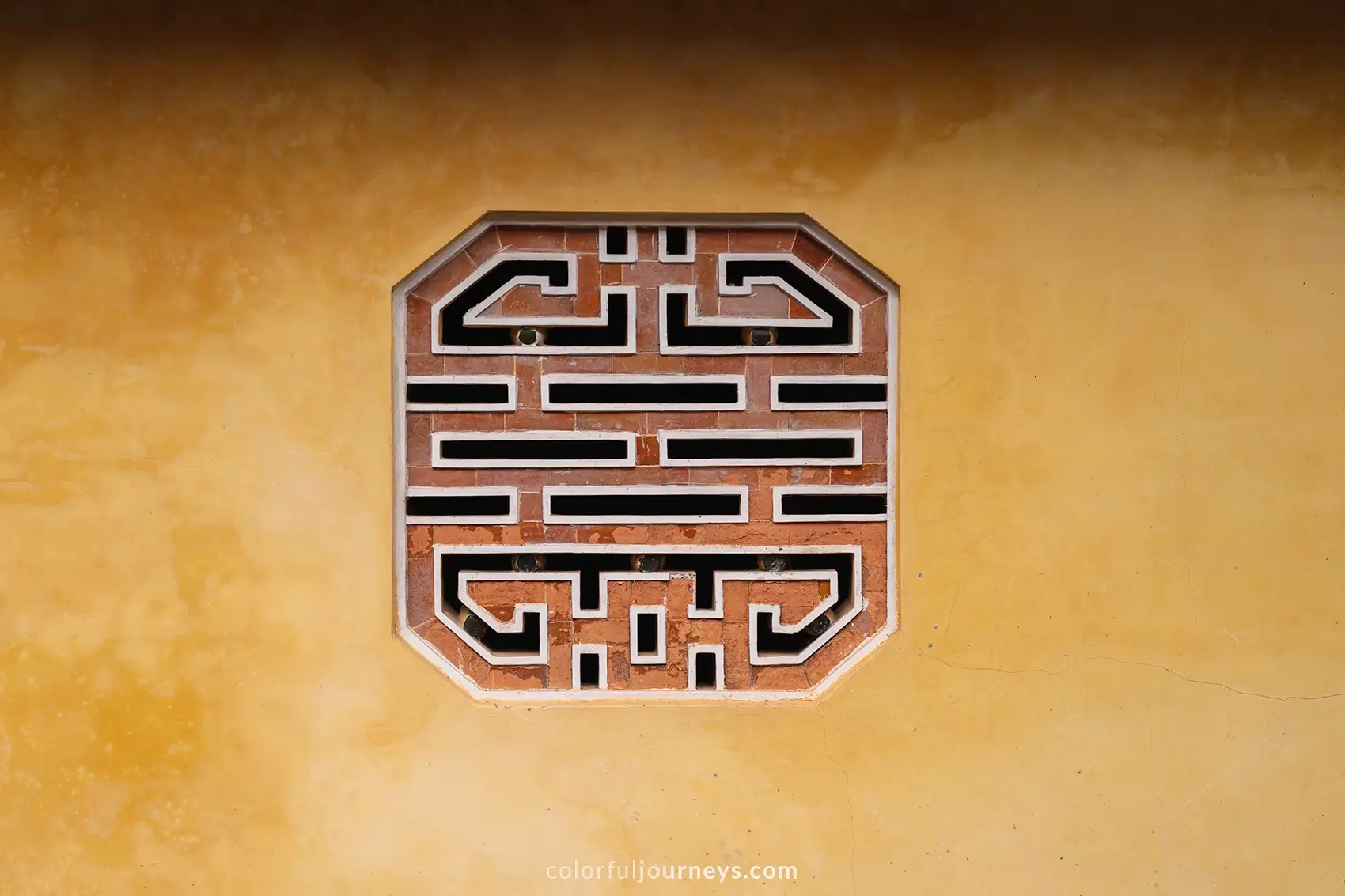 Mosaic decorations at a temple in Hue, Vietnam