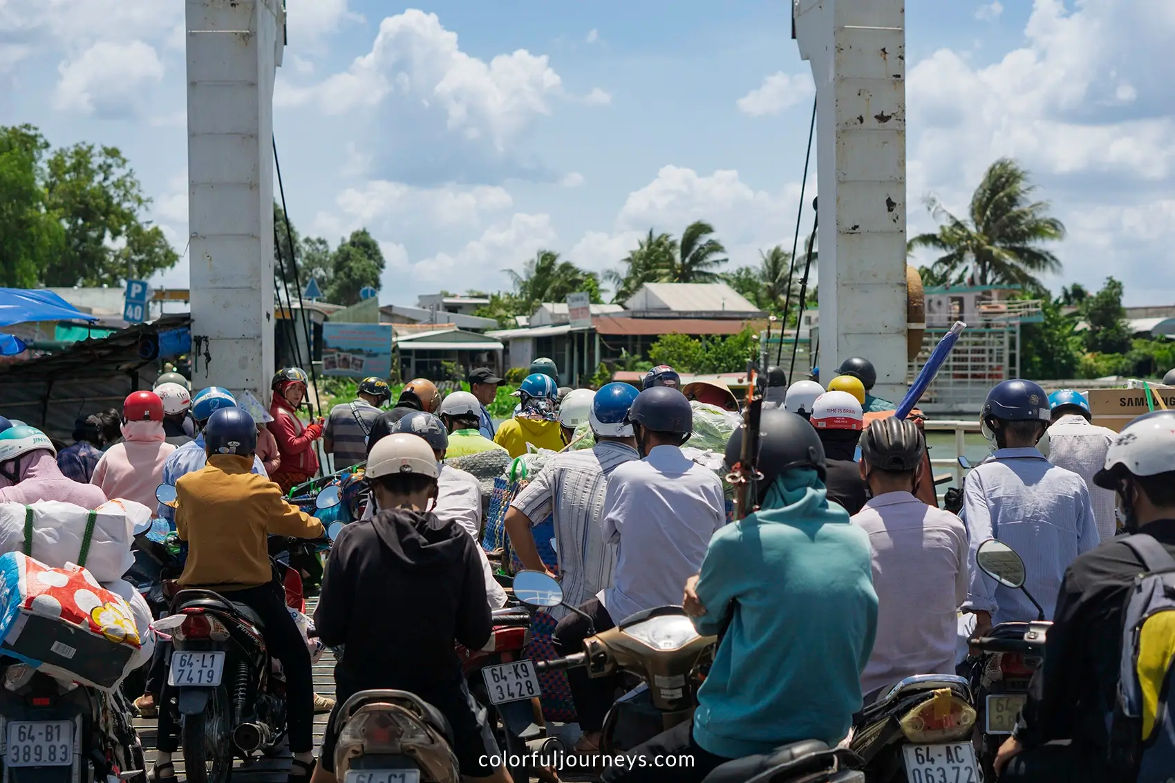 Commuters on a ferry to An Binh Island n Vietnam