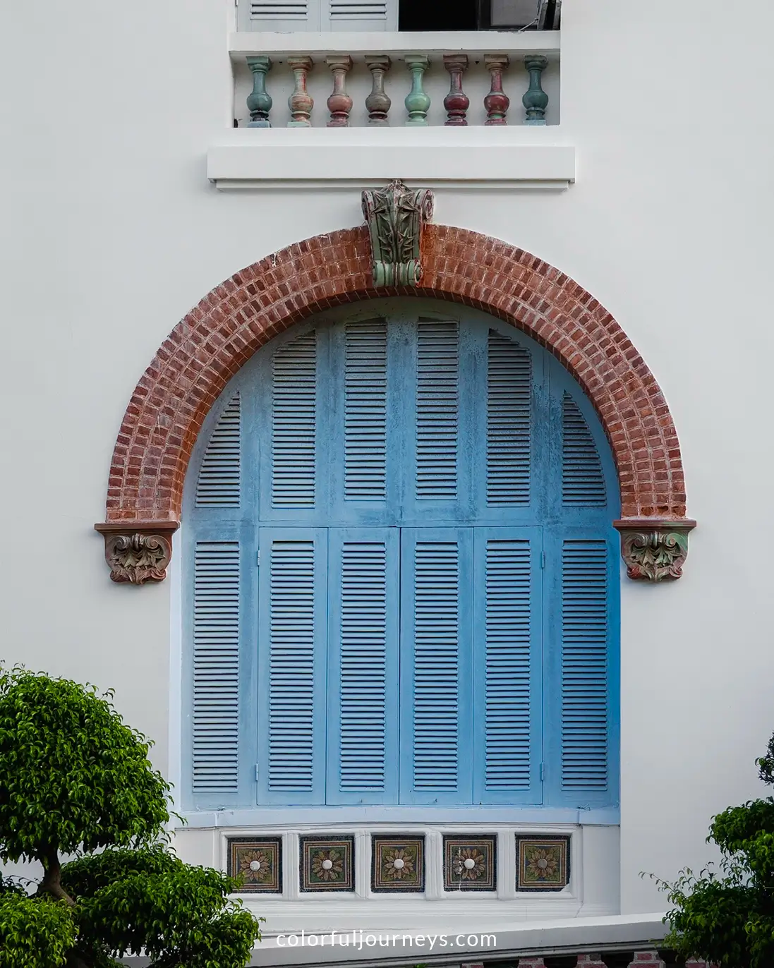 Shuttered windows at the White Villa in Vung Tau, Vietnam