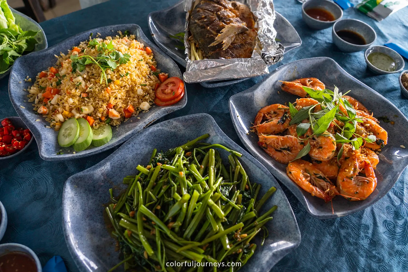 Plates of seafood at a restaurant in Vung Tau, Vietnam