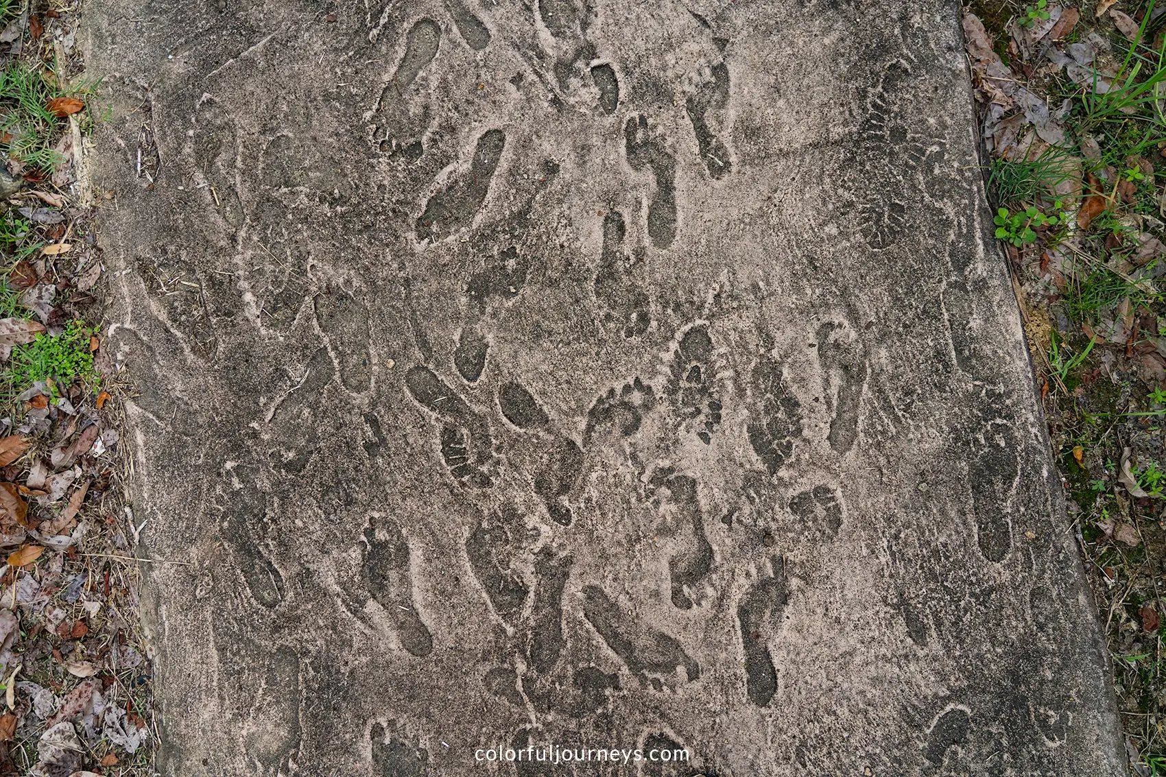 Footsteps in the pavement at Son My Memorial in Quang Ngai, Vietnam