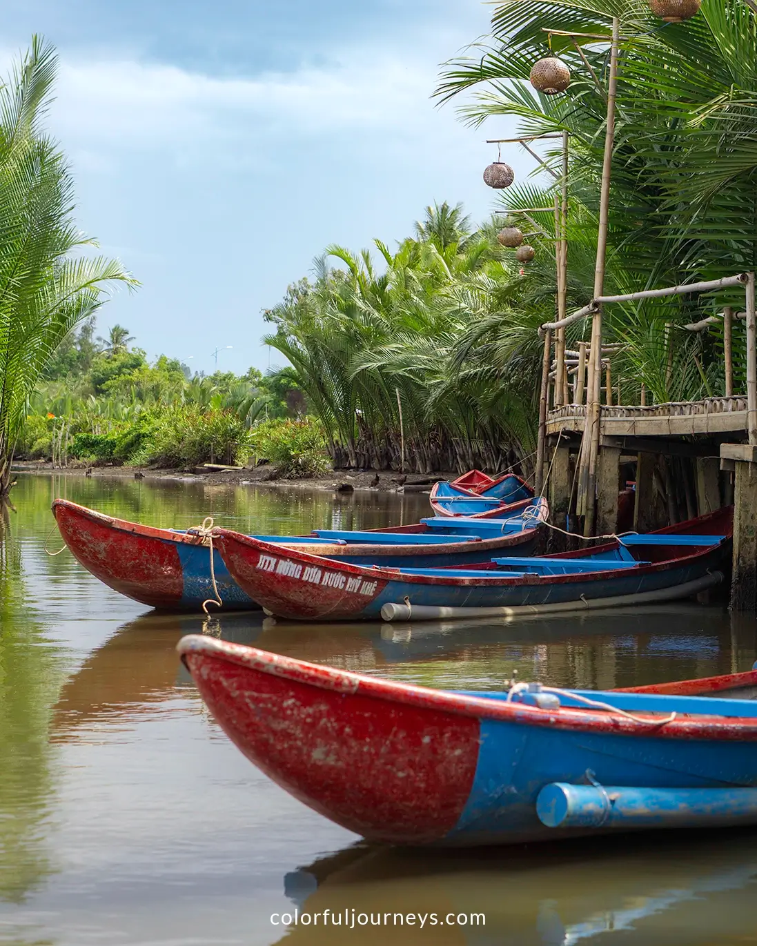 Colorful boats at Tinh Khe Nipa Palm Forest in Quang Ngai, Vietnam