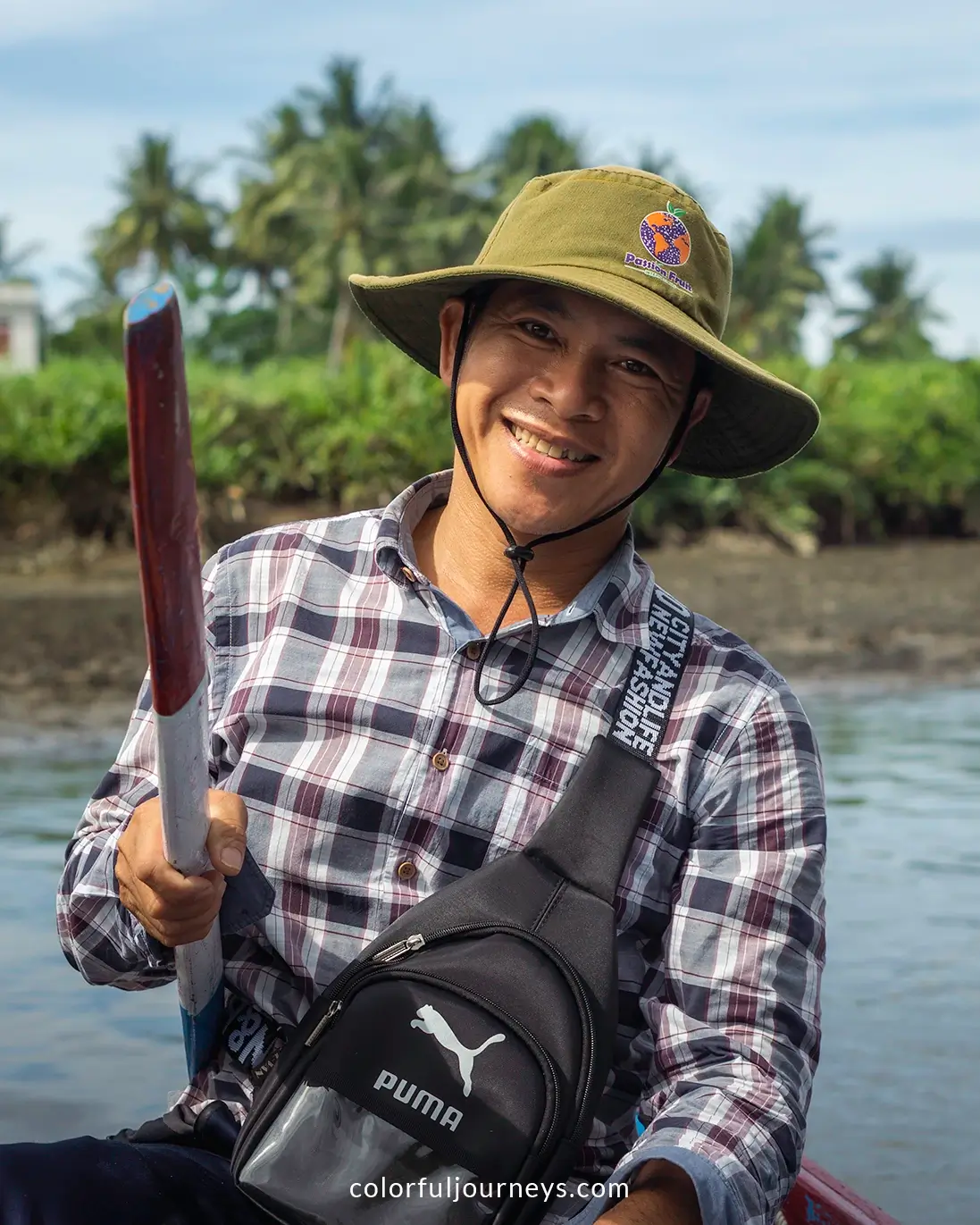 A boat rower at Tinh Khe Nipa Palm Forest in Quang Ngai, Vietnam