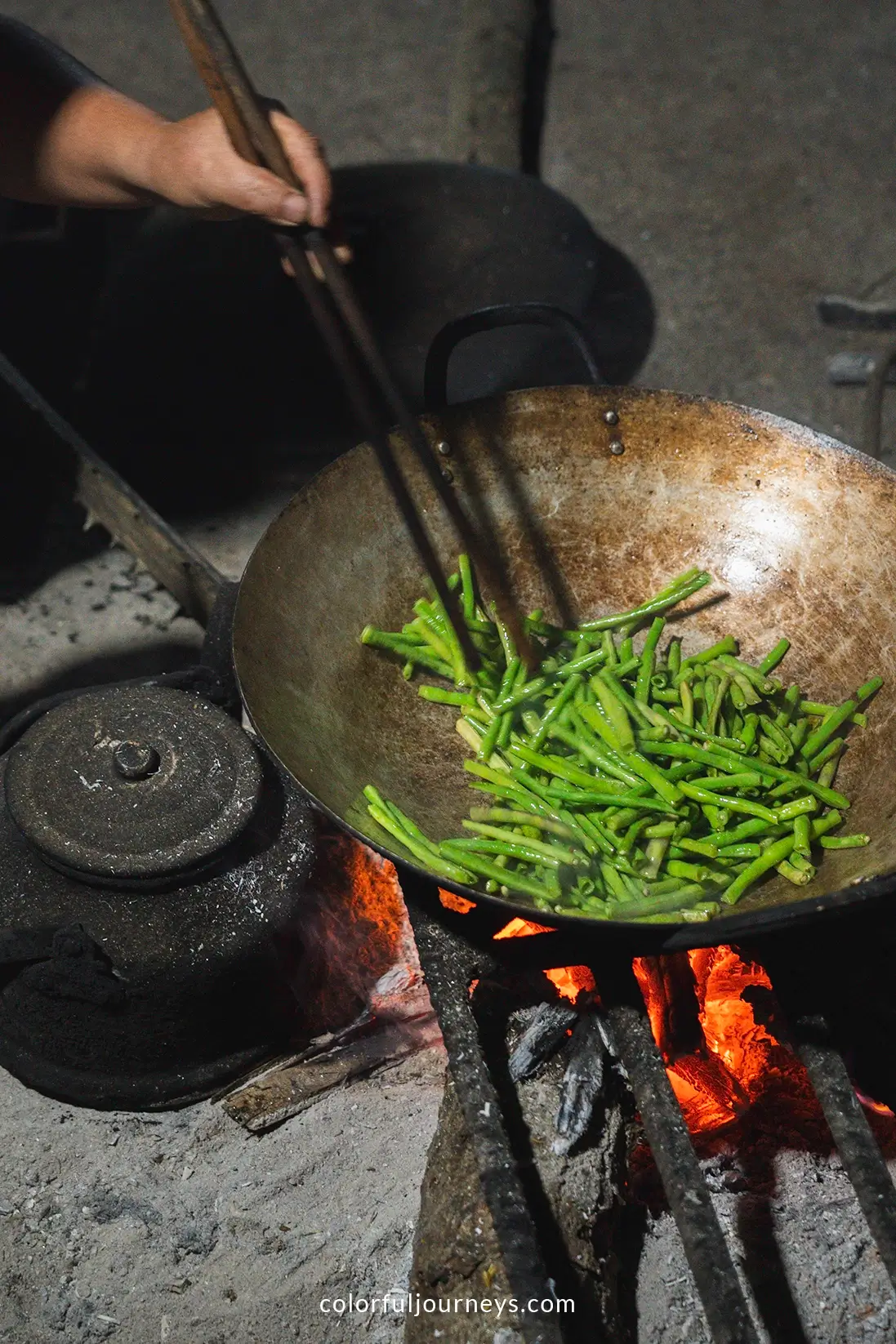 Beans being cooked on a wooden fire at a homestay in Northern Vietnam