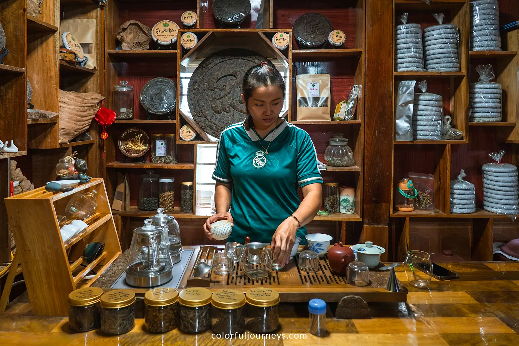 A woman prepares tea in Vietnam