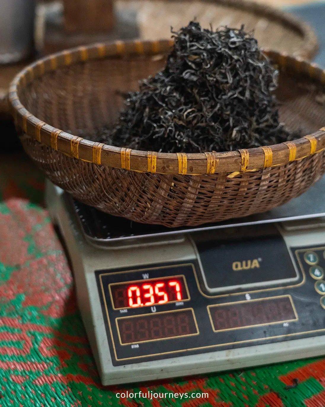 A basket with tea on a scale in Ha Giang, Vietnam
