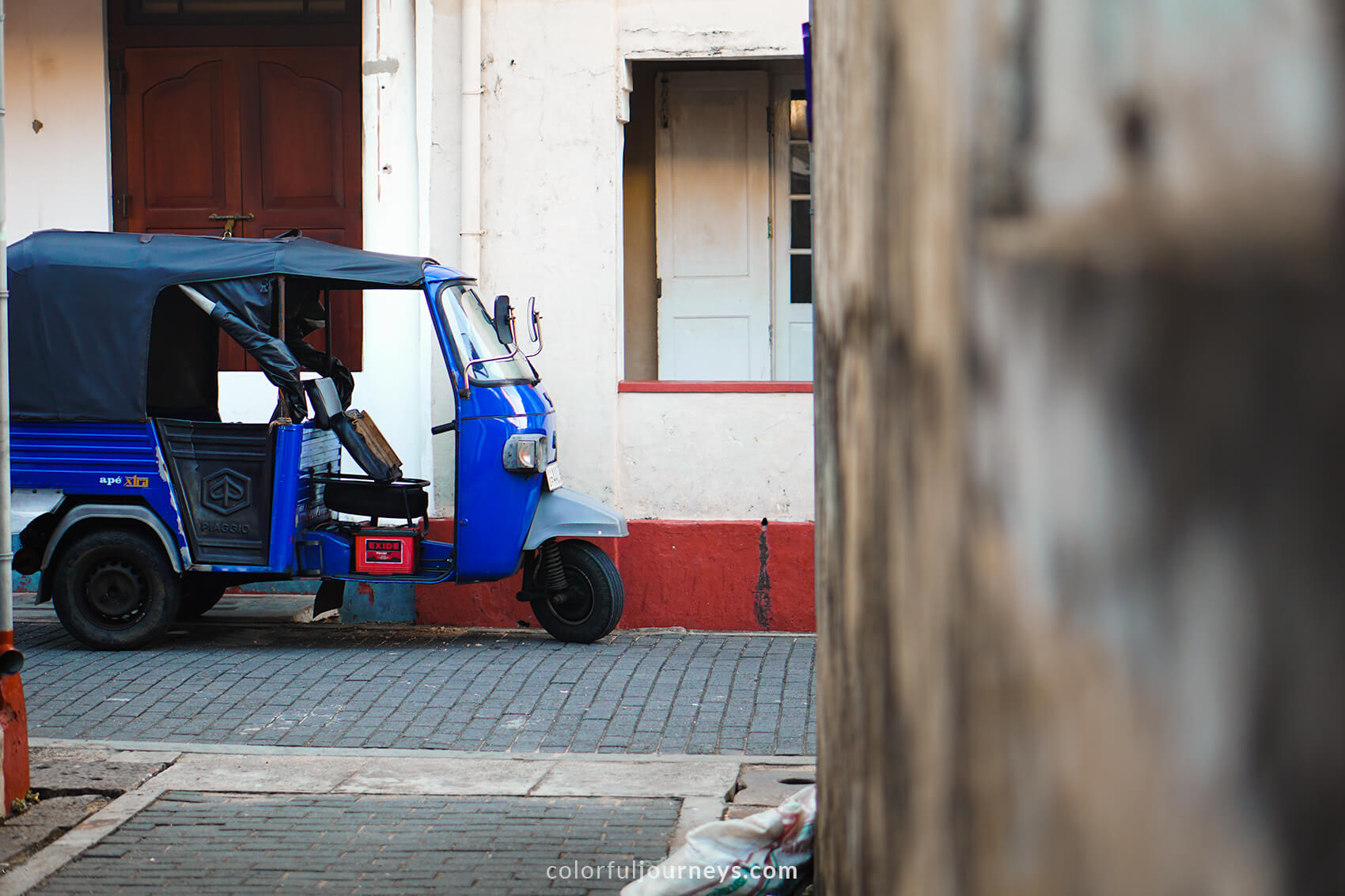 A blue tuk-tuk in Galle Old Town, Sri Lanka. 
