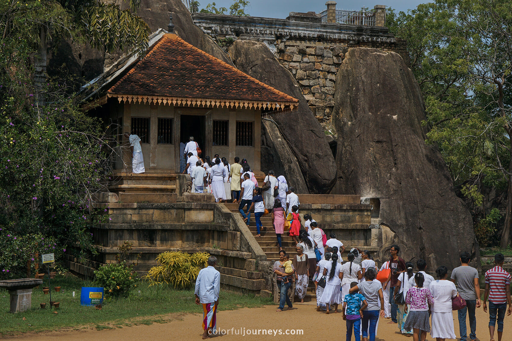Locals dressed in white at a temple in Anuradhapura, Sri Lanka. 
