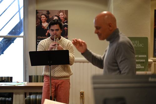 Ryan Turner conducts students performing Bach