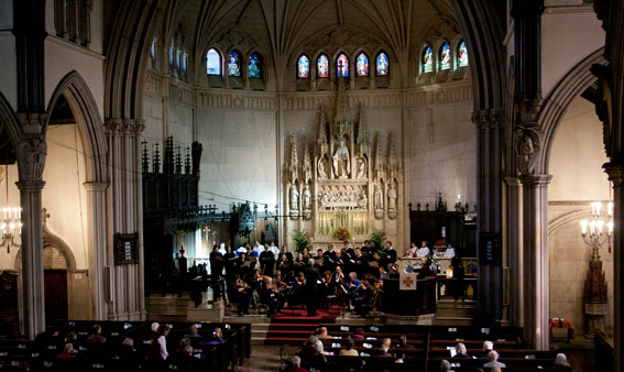 Interior of a church with a choir singing