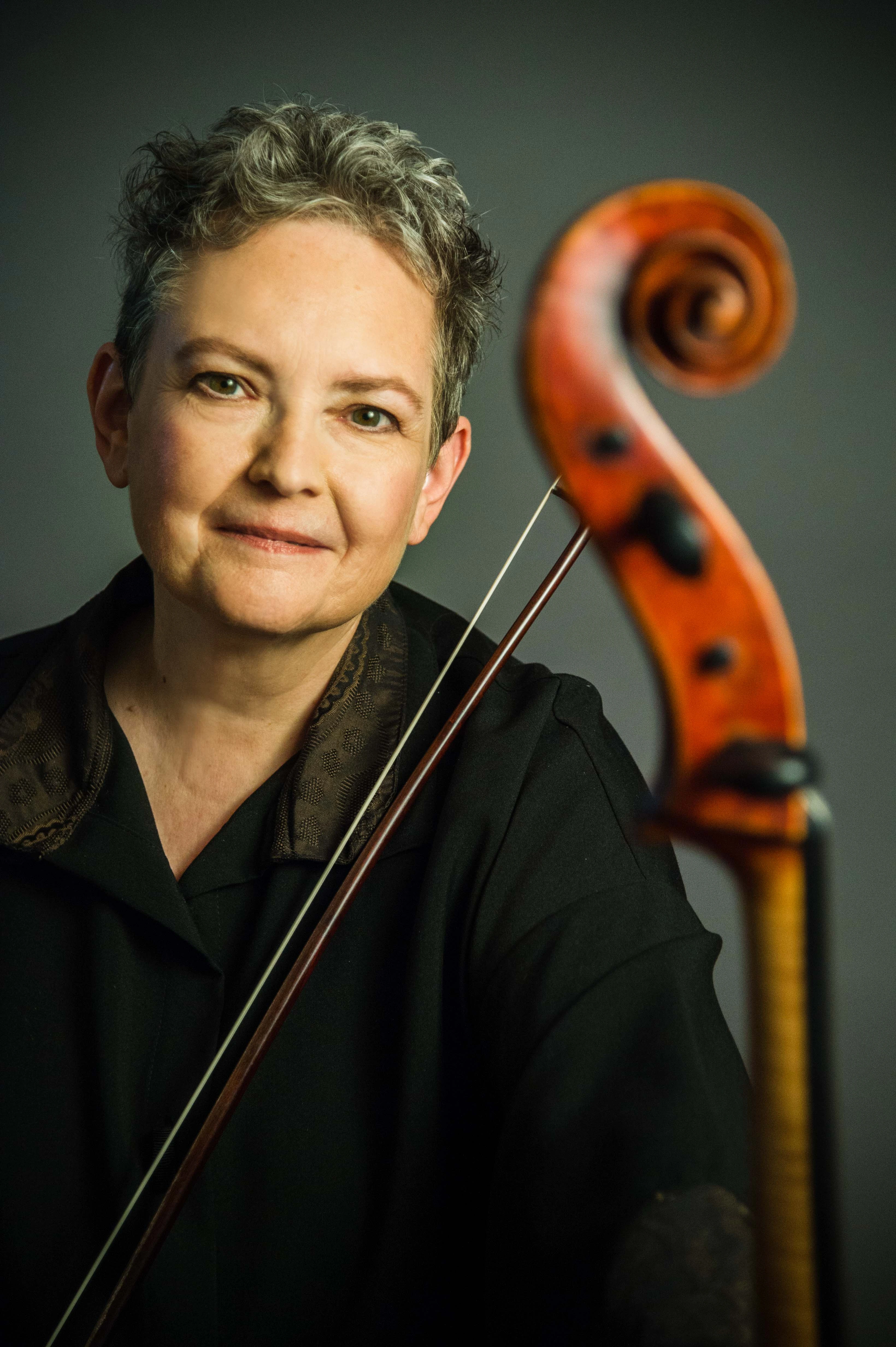 A headshot of a cellist
