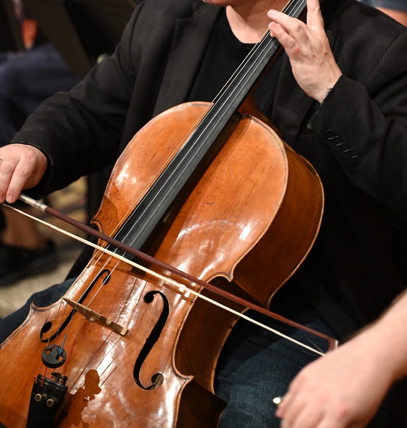 A man playing cello