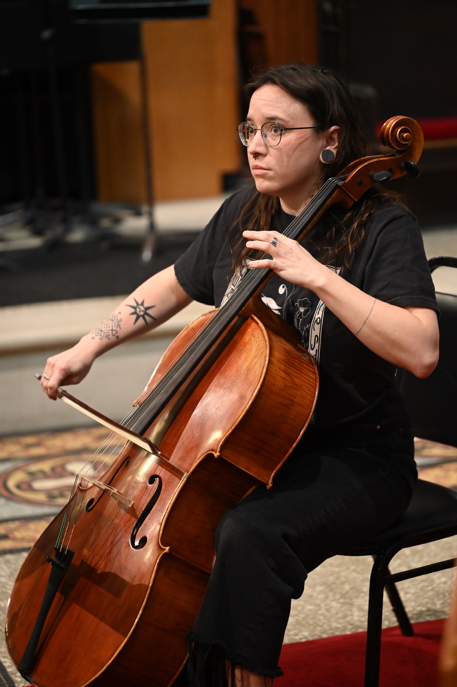 A woman plays the cello