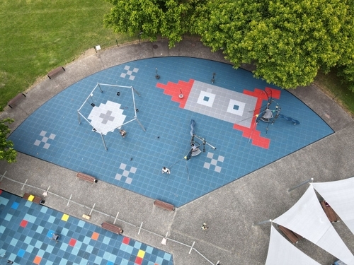 Rocket shaped safety tiles at playground in Auckland