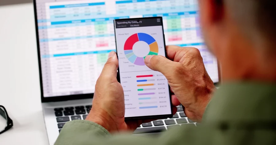 Older man using retirement planning app