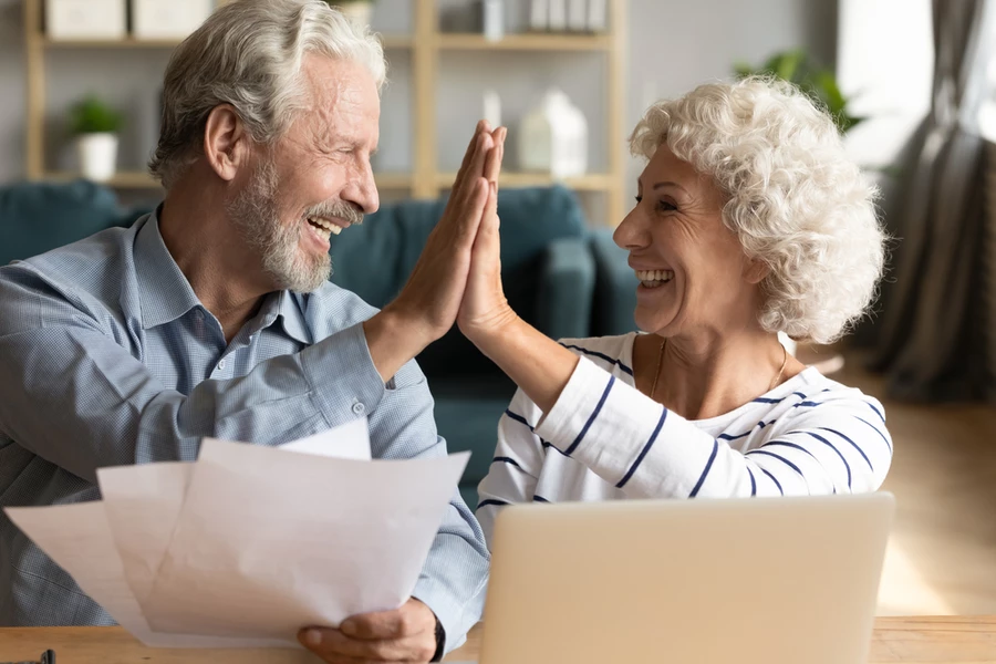 Man giving high five to wife