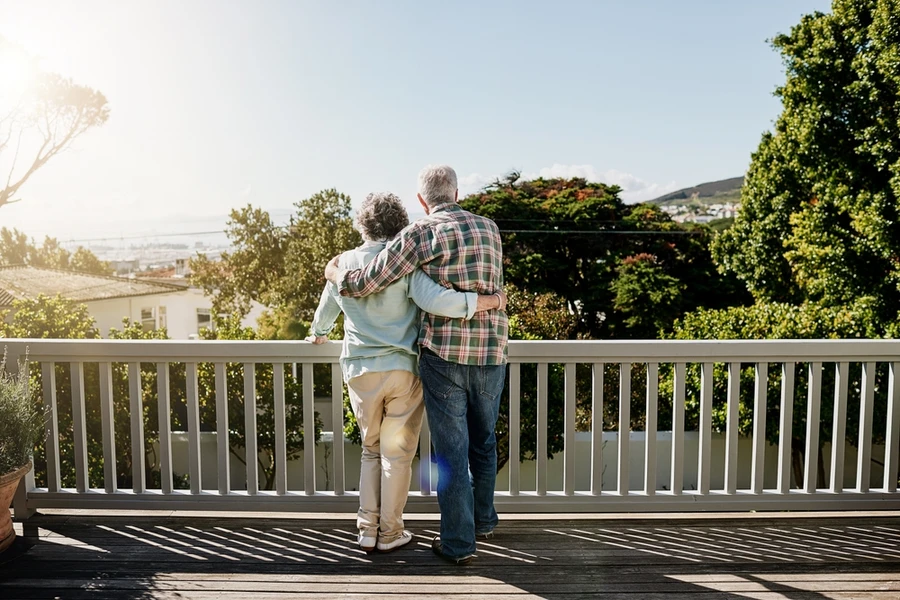 Morning, balcony and back of senior couple hug