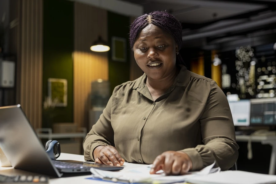 Woman reviewing financial documents
